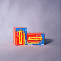 Two boxes of FotoStop 200 film on a gray background
