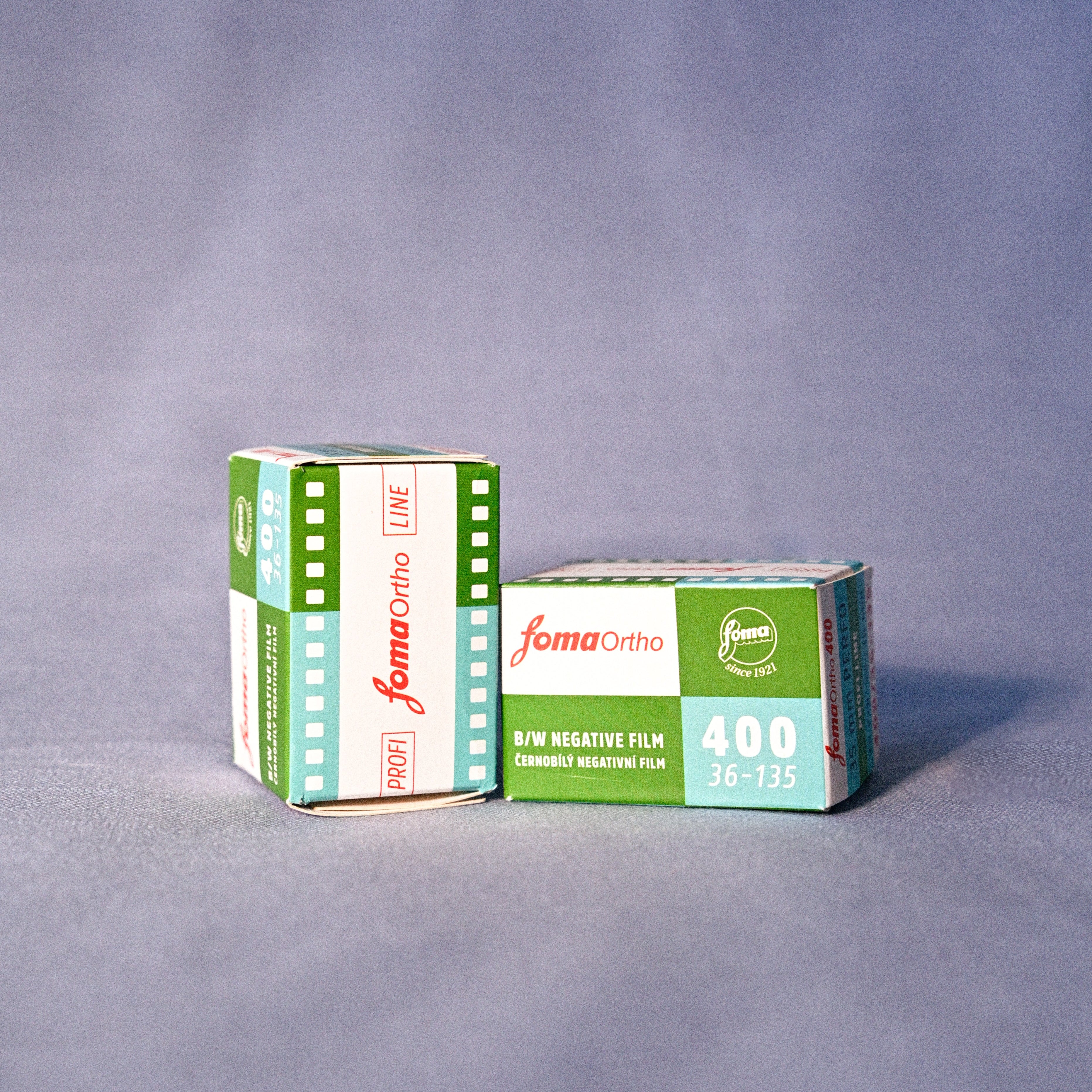 Two boxes of Foma Ortho film on a gray background