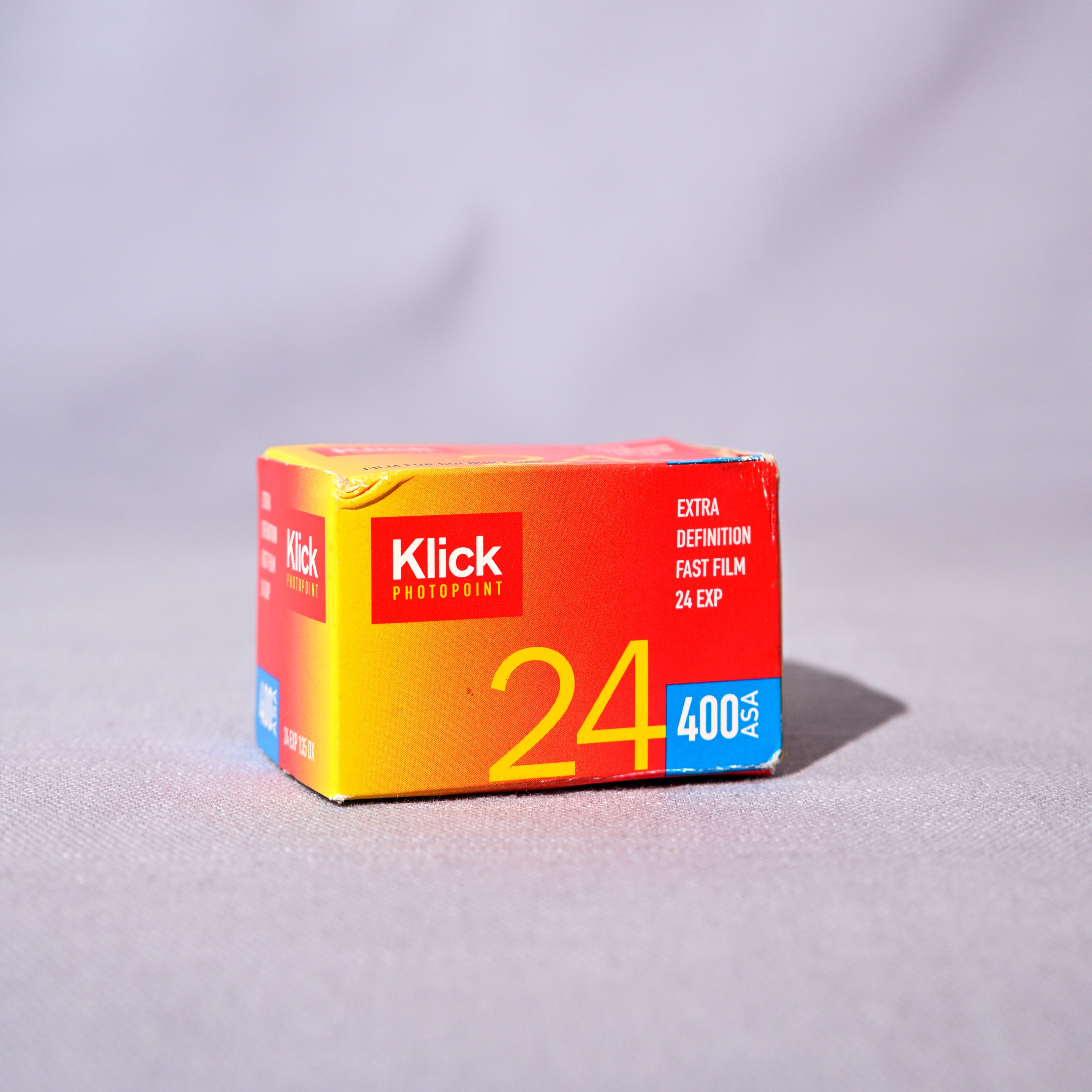 Klick film box on a gray background