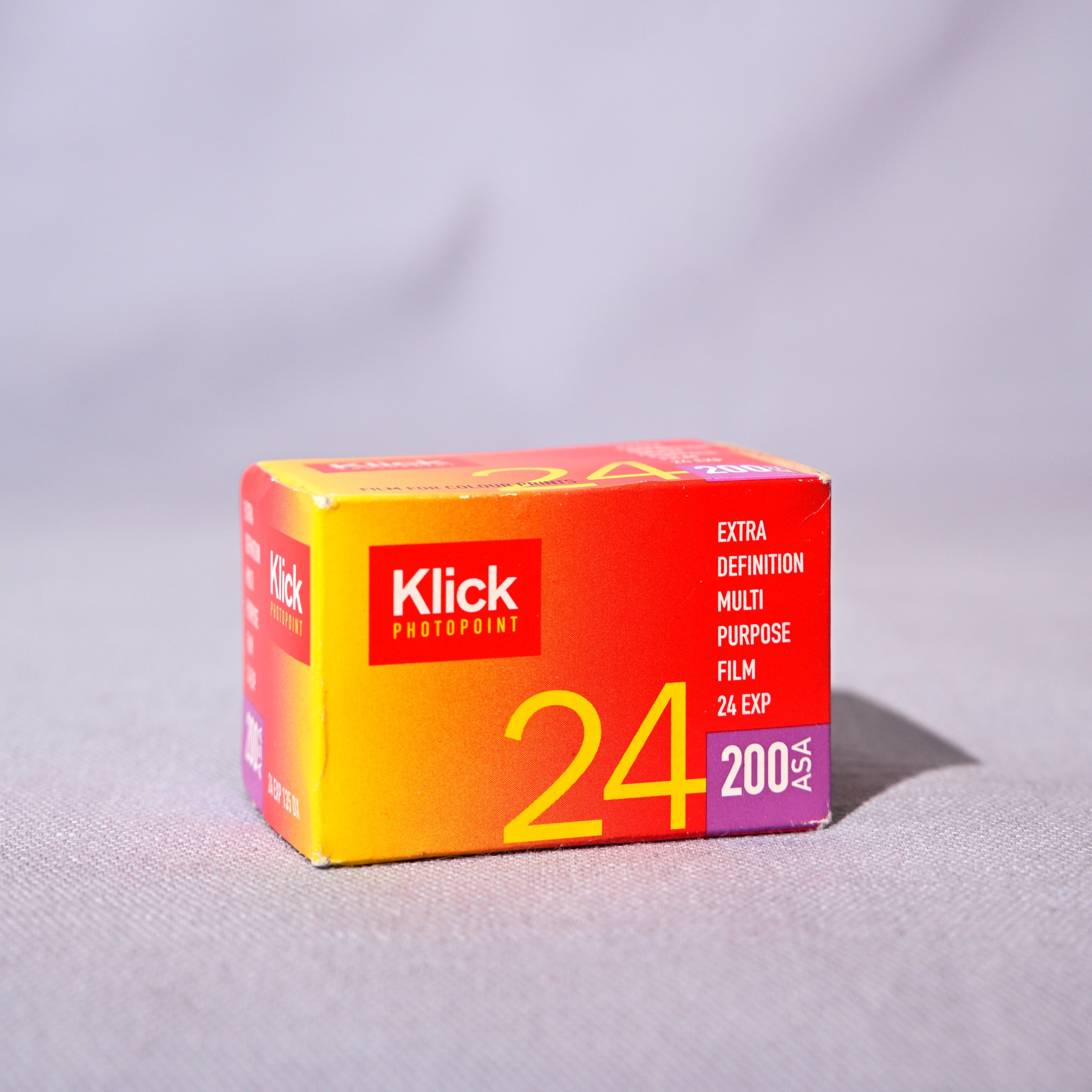 Klick photo film box on a gray background